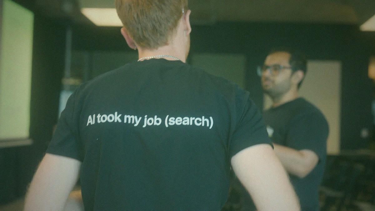 The back of a Clera t-shirt reading AI took my job (search)
